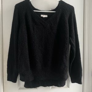 fuzzy black sweater